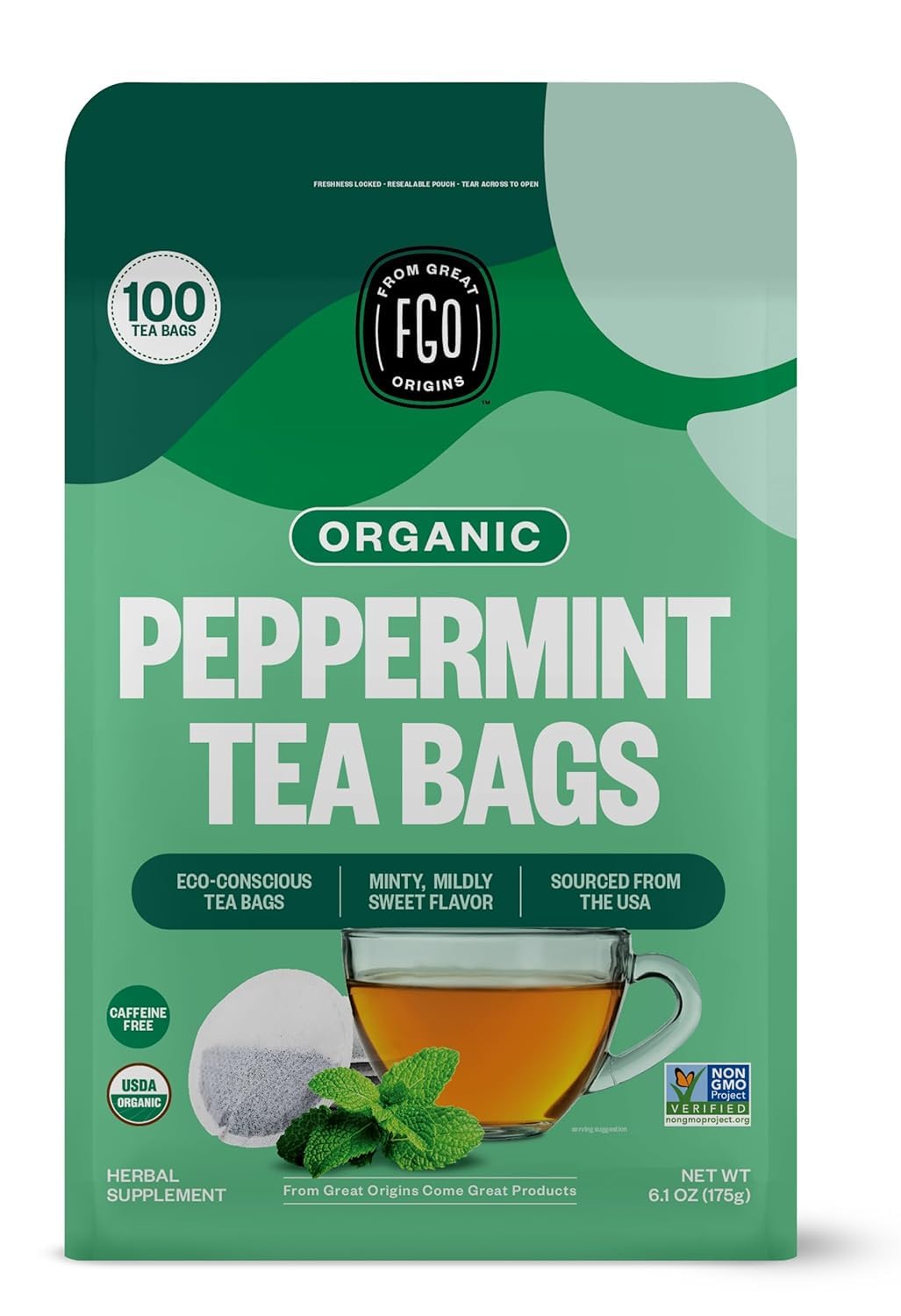 Organic peppermint tea bags package with eco-conscious label and mint leaves.