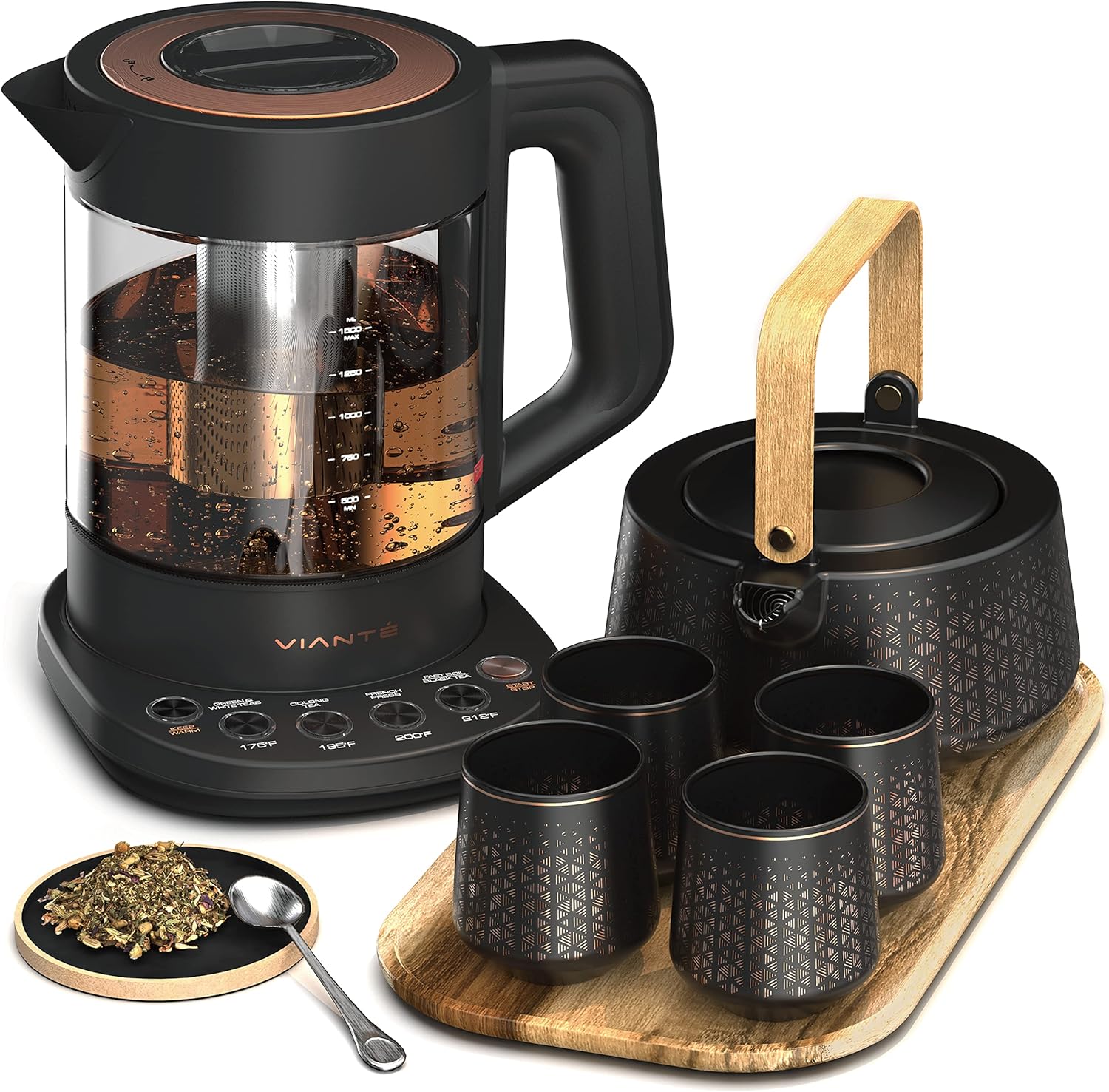 Electric tea kettle set with teapot, four cups, wooden tray, and loose tea leaves.